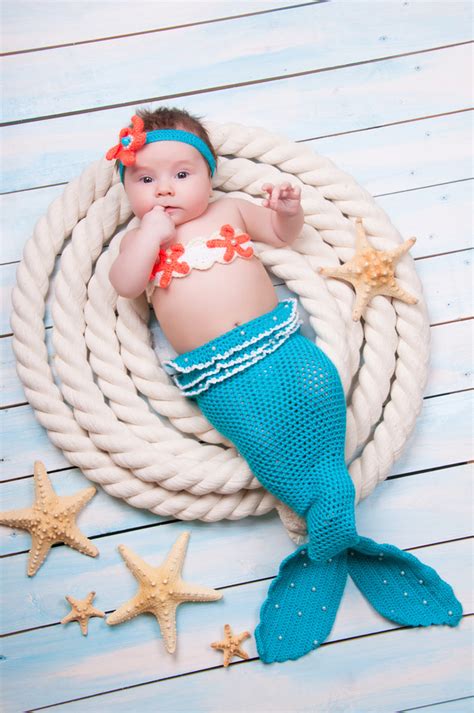 A Glimpse into the Whimsical Explorations of Infant Mermaids