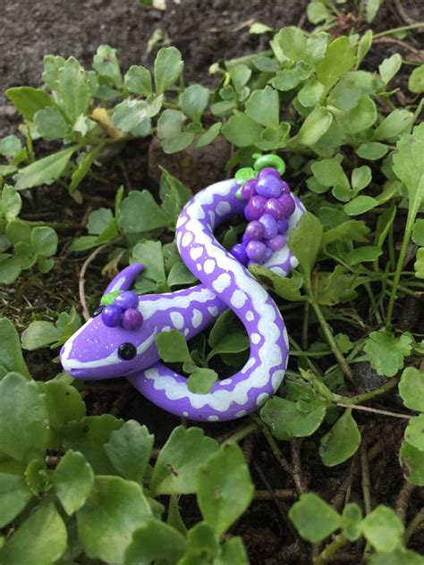 Cultural and Historical Allusions to Azure Grape Snakes in Visionary Experiences