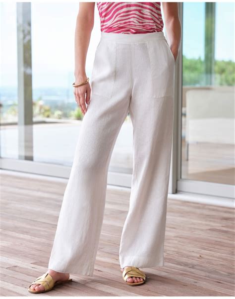 Embrace the Versatility of Ivory Trousers: Exploring the Various Ways to Effortlessly Sport this Enduring Fashion Staple