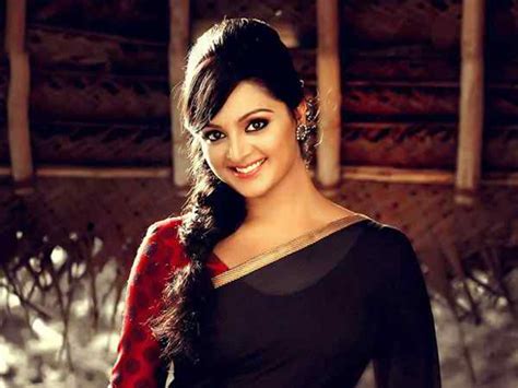 Explore Manju Warrier's Figure Measurements