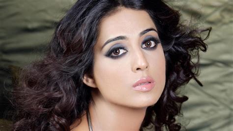 Exploring Mahie Gill's physical attributes