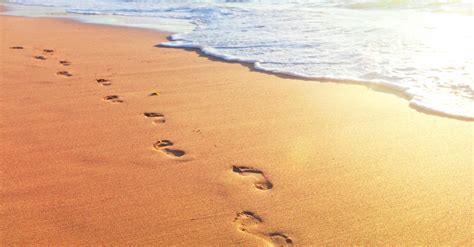 Exploring the Significance of Footprints in Dreams Involving Sand Travel