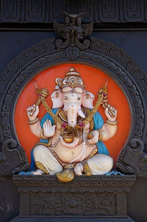 Exploring the Significance of the Crimson Ganesha in Hindu Mythology