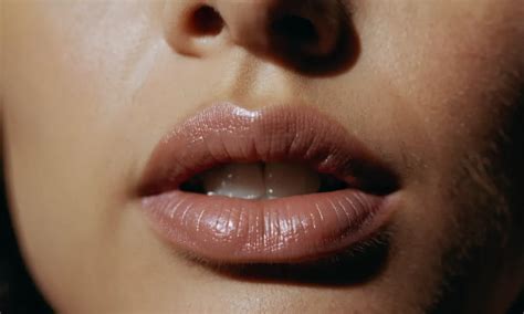 Exploring the Symbolism Behind Embracing Another's Lips: Decoding Subliminal Thoughts