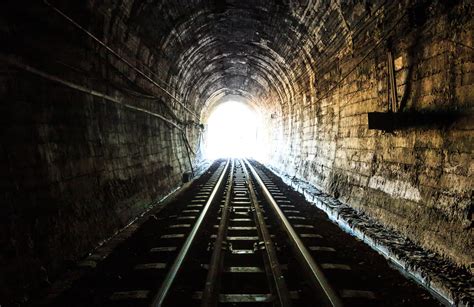 Exploring the Themes of Darkness and Light in Train Tunnel Dreams