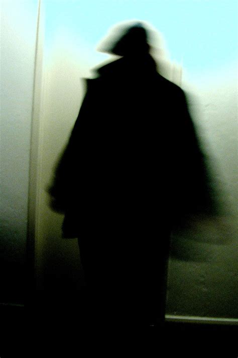 How Tall is the Mysterious Figure?