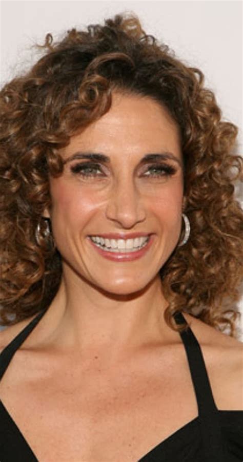 Melina Kanakaredes' Body Measurements and Fitness Routine