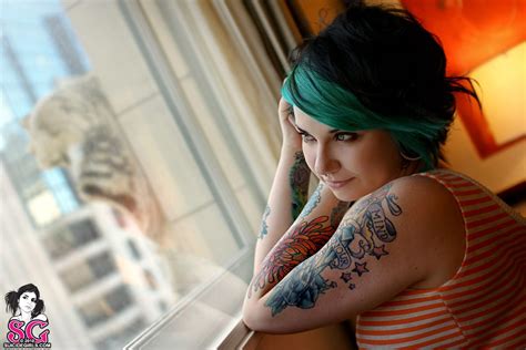 Tattoos and Body Modifications of Quinne Suicide