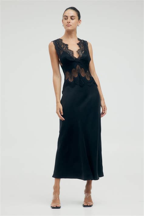 The Deeper Significance of Visions Featuring an Elegant Ebony Gown