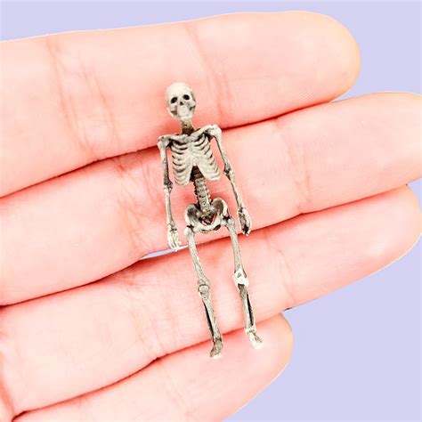 The Enigmatic History of Tiny Skeletal Figures