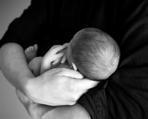 The Symbolic Meanings of a Deceased Individual Cradling an Infant