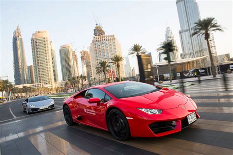 The Ultimate Adrenaline Rush: Embrace the Excitement of Driving a Vibrant Crimson Supercar