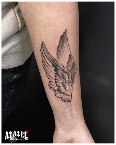 Unveiling the Spiritual and Personal Meanings of Angel Wing Tattoos